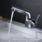 Saque el grifo del baño, el grifo mezclador de lavabo con rociador